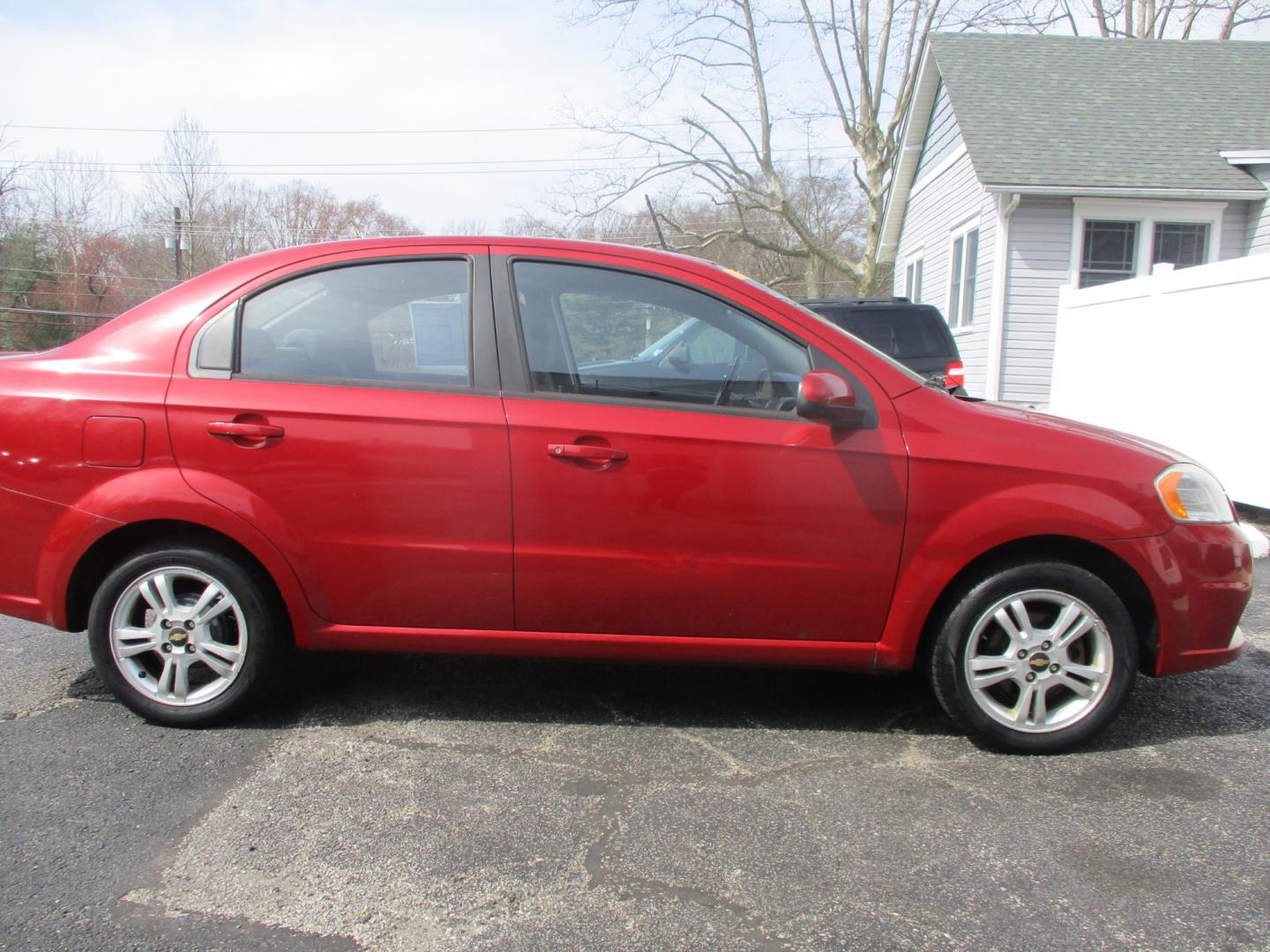 2011 RED Chevrolet Aveo (KL1TD5DE6BB) with an 1.6L L4 DOHC 16V engine, AUTOMATIC transmission, located at 540a Delsea Drive, Sewell, NJ, 08080, (856) 589-6888, 39.752560, -75.111206 - Photo#6